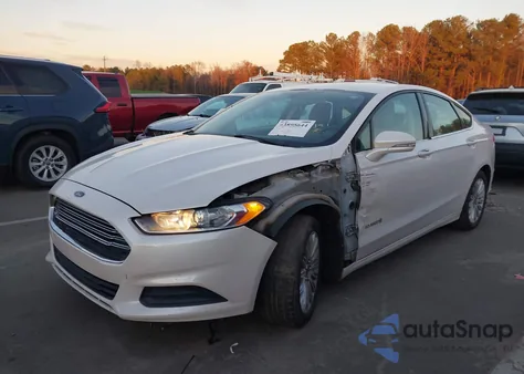 2013 Ford Fusion Hybrid Se z USA, uszkodzony, nr VIN 3FA6P0LU1DR271116